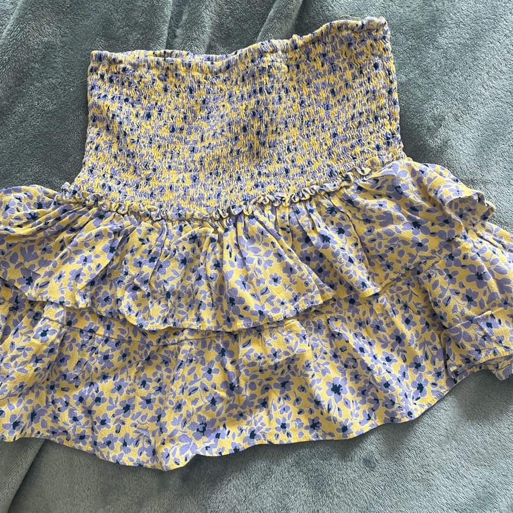 Cute purple and yellow skirt. Perfect for summer and beach days.